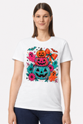 Woman wearing a white t-shirt with a Halloween stacked pumpkins, ghosts and bow print