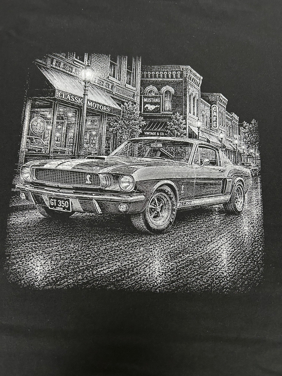 Close-up of the 1966 Shelby Mustang GT350 print on a black t-shirt