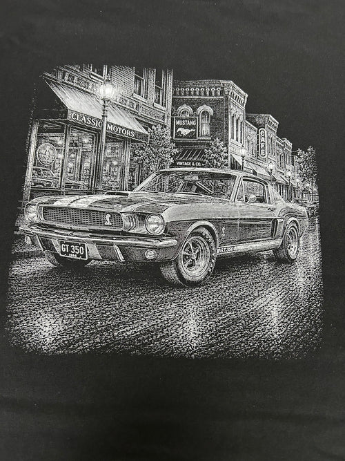 Close-up of the 1966 Shelby Mustang GT350 print on a black t-shirt