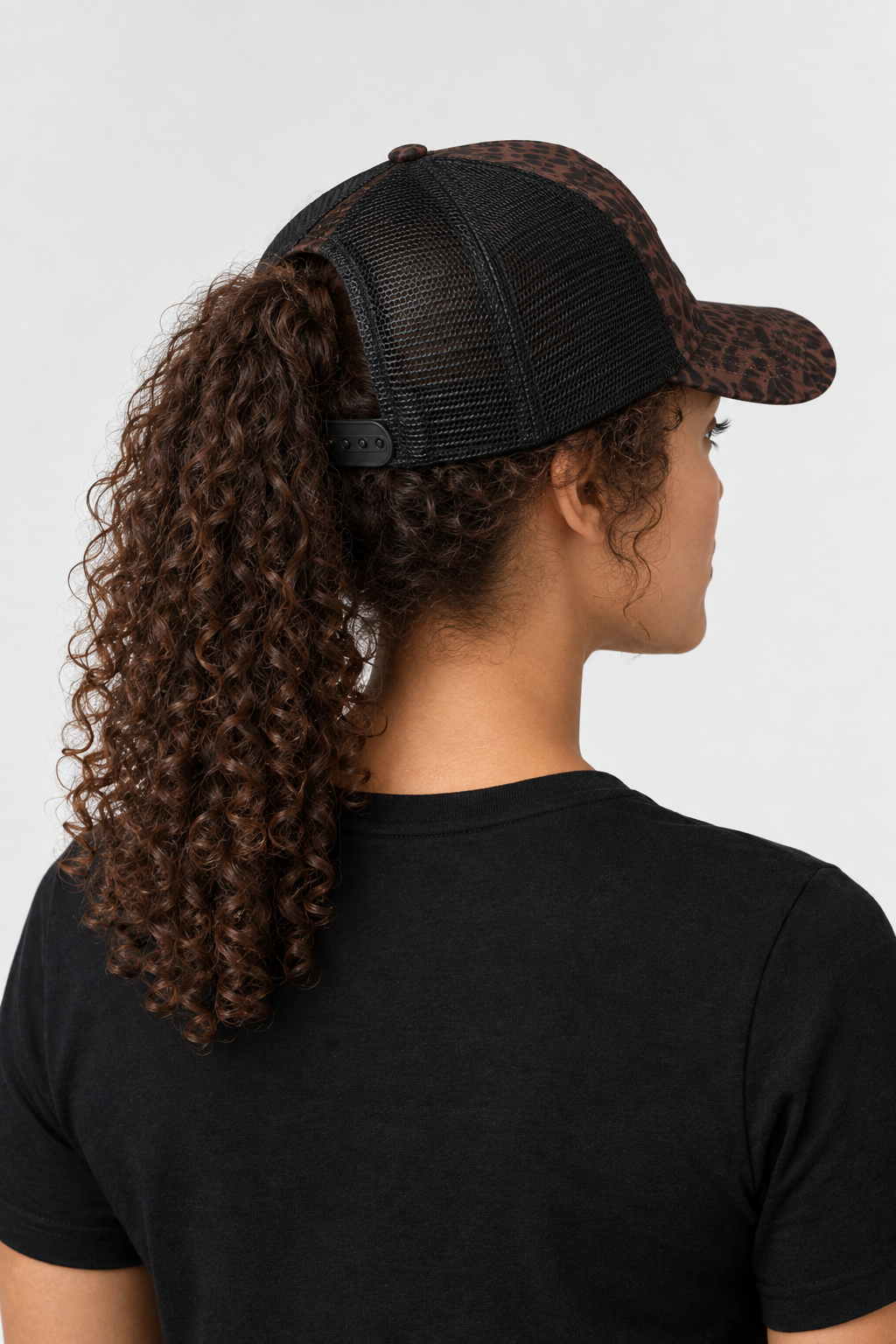 A Lil Bougie hat from the back with ponytail