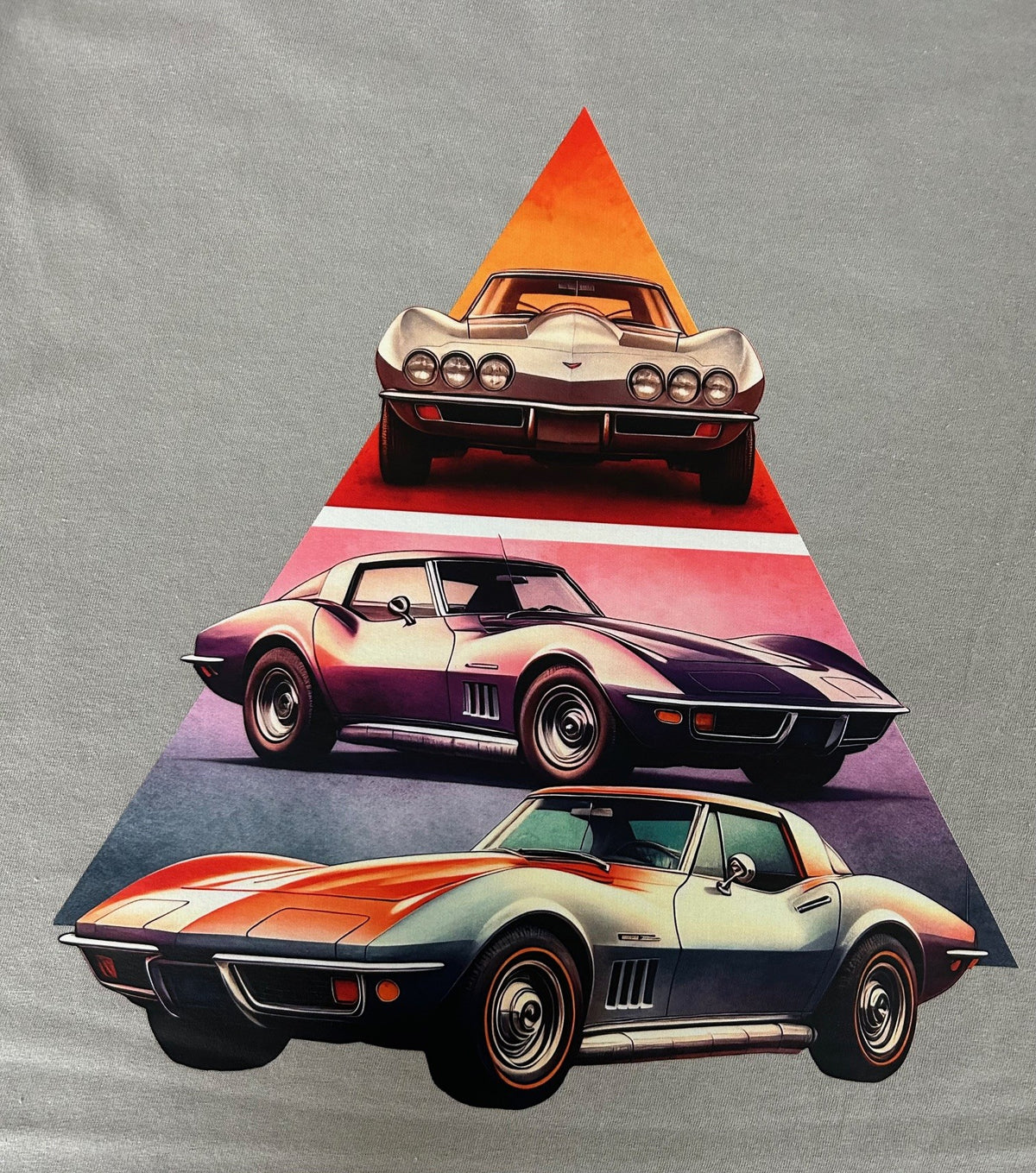 Close-up of the Corvette Stingray triangle print on a gravel grey t-shirt
