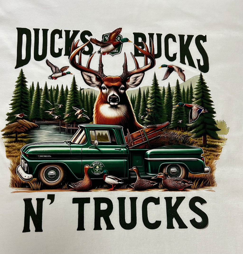 Close-up of the Ducks Bucks N' Trucks print on a white t-shirt