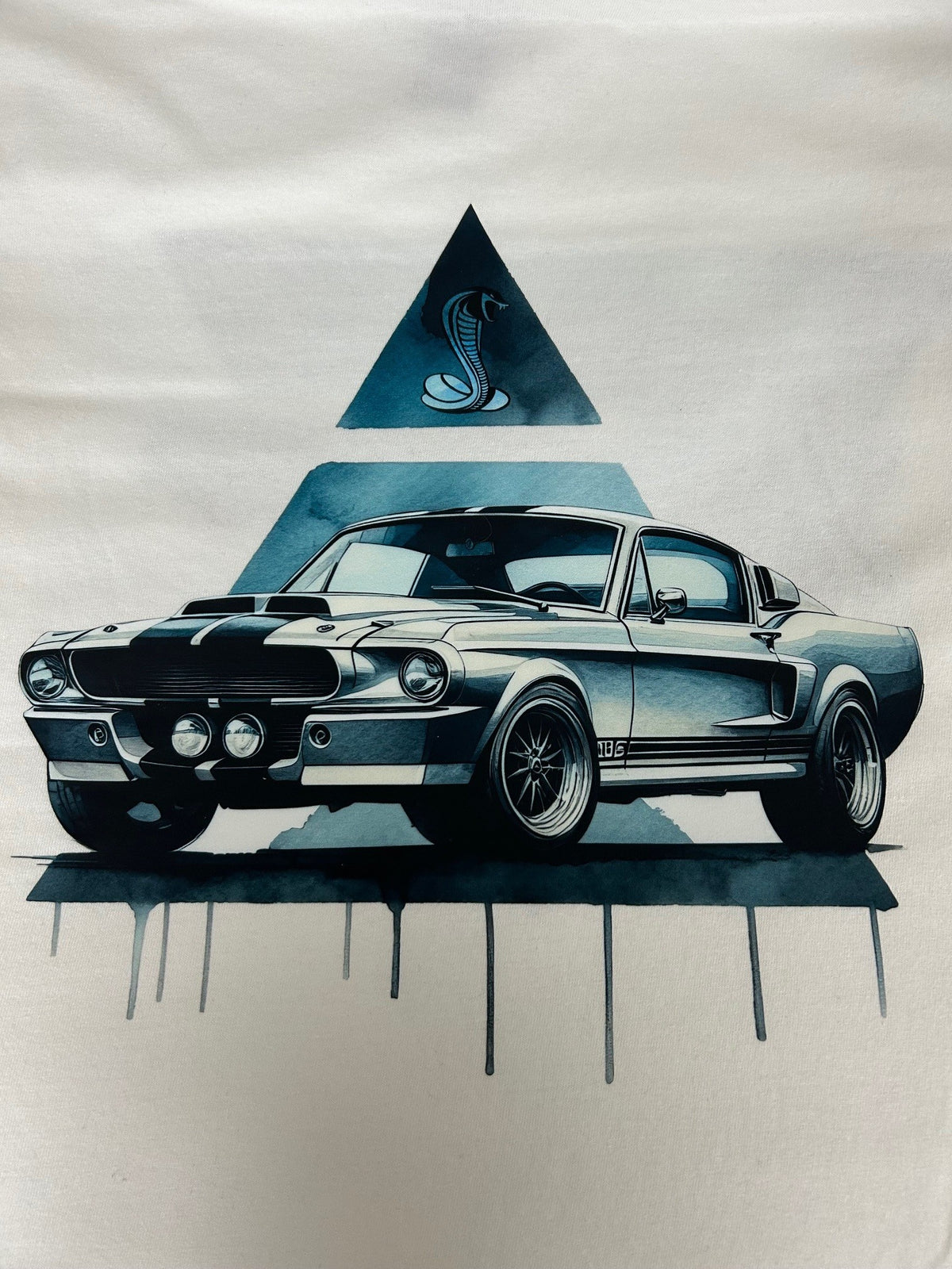 Close-up of the Shelby Mustang GT500 cobra print on a white t-shirt