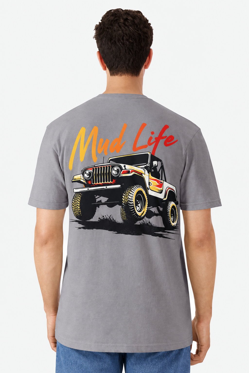Back view of a model wearing a gravel grey t-shirt with a large Mud Life Jeep CJ print