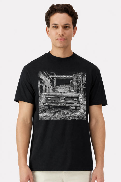 Model wearing a black t-shirt with a detailed 1967 Pontiac GTO factory print