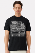 Model wearing a black t-shirt with a detailed 1966 Shelby Mustang GT350 main street print
