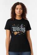Woman wearing a black t-shirt with a gothic Witchy witch hat and broomstick print