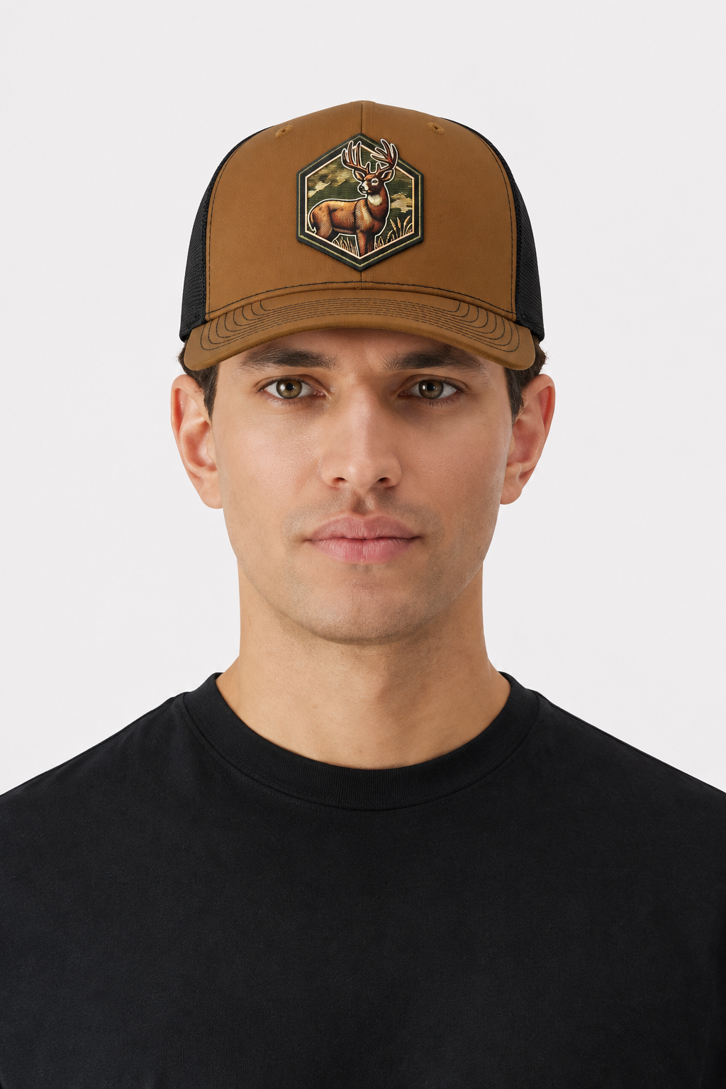 Whitetail deer Richardson 112 trucker hat with caramel front, black mesh back, and buck patch on model