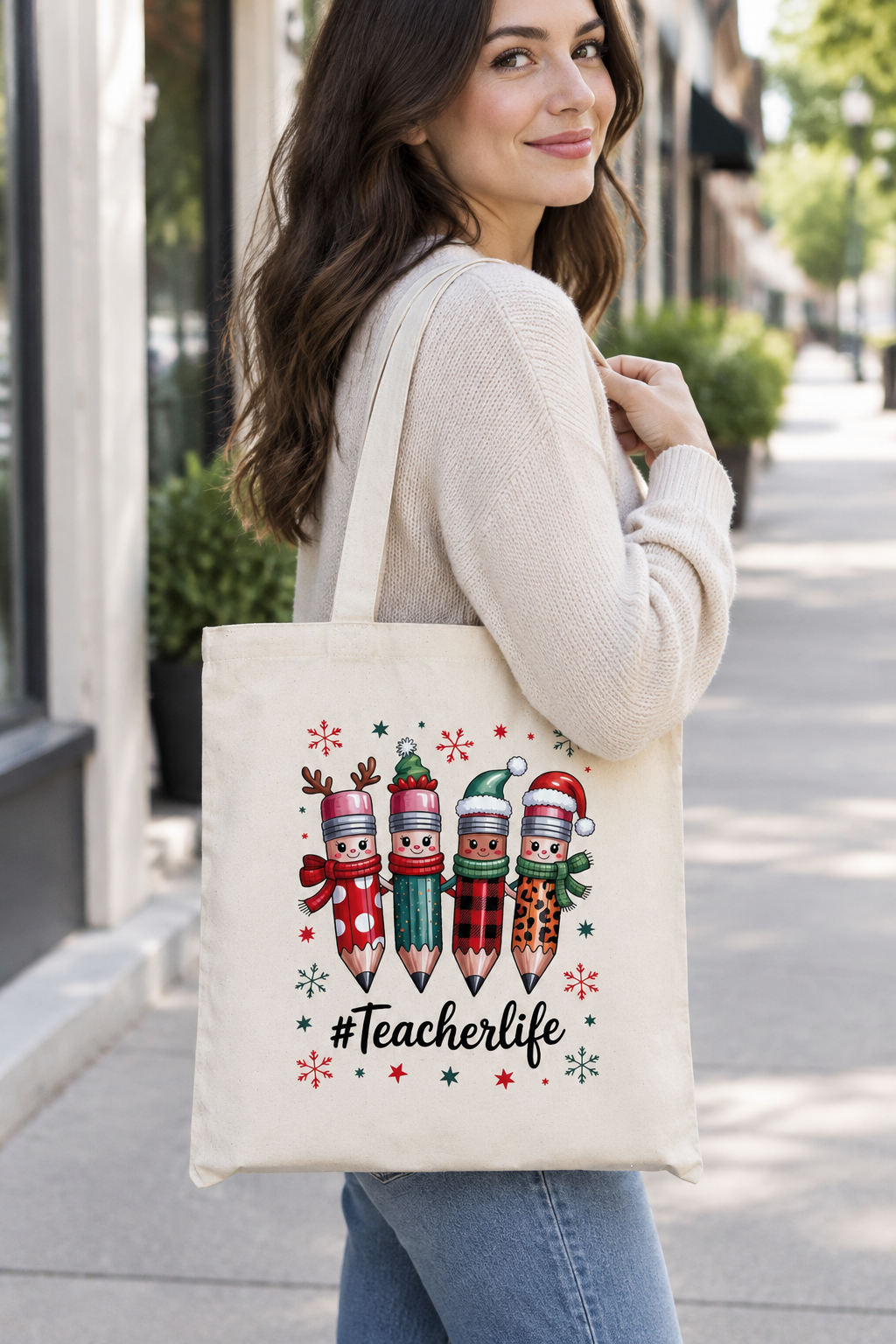 Model carrying Teacher Life Christmas canvas tote bag