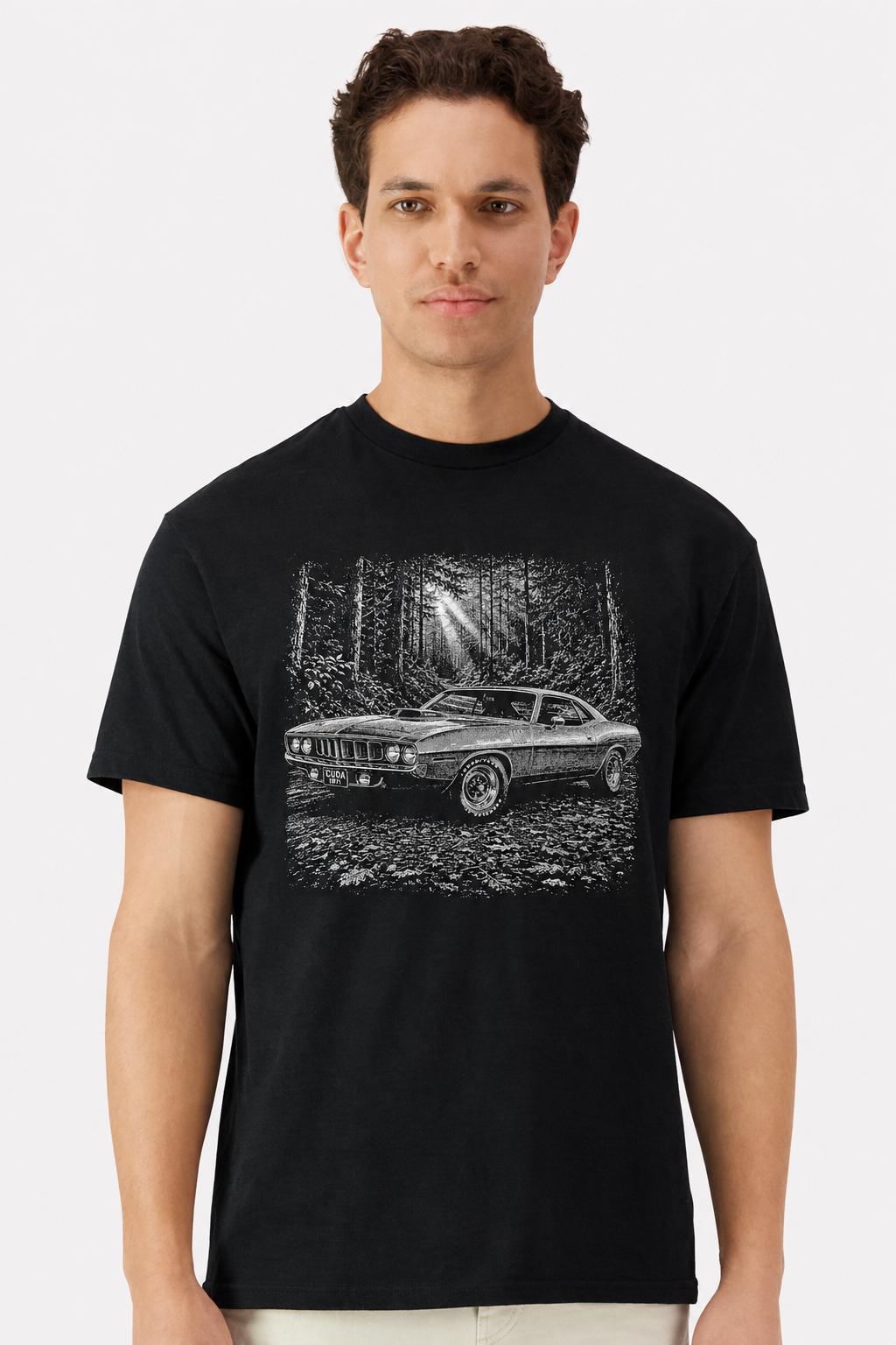 Model wearing a black t-shirt with a detailed 1971 Plymouth Cuda forest road print